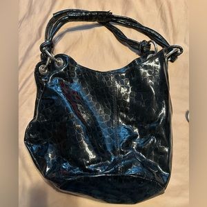 Black purse with unique zip